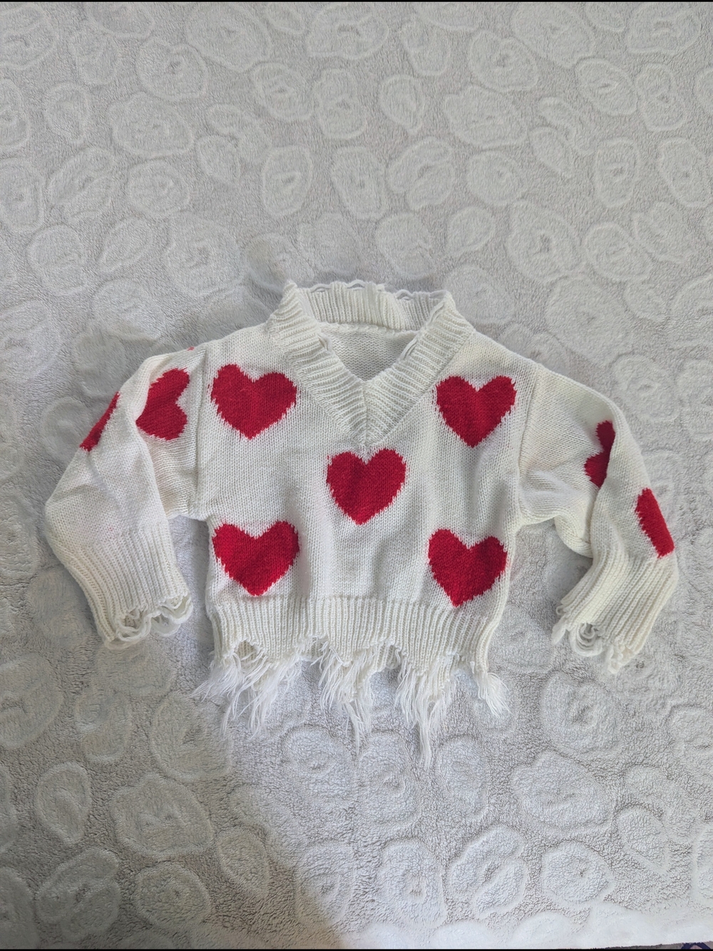 White V-Neck Sweater with Red Heart Pattern